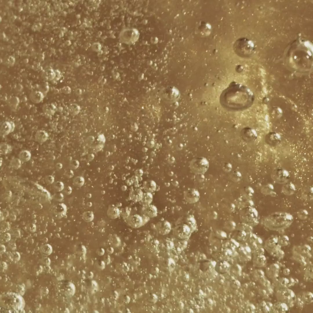 zesty and spicy with everything nicey text over soda video background